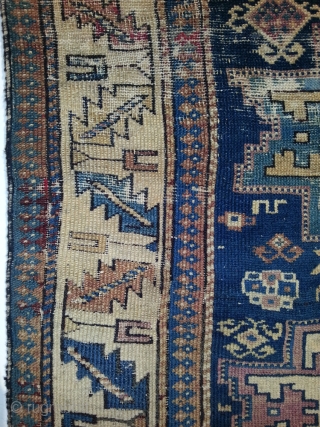 East caucasian carpet with Leshgi stars, 19th.C. 110 x 209 cm. Some old repairs, cuts and partially very worn.              