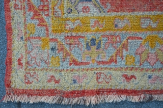 Exceptional West Anatolian Carpet with an Ushak type Medallion. The field is ornamented with different shades of apricot. Some damages on the upper right side. 173 x 106 cm    