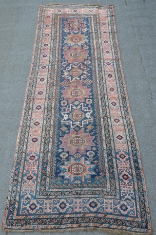 East Caucasian Leshgi, green ground Kufi border, 354 x 134 cm, a twin piece is illustrated in Doris Eder's "orient carpets" vol. I. Caucasian plate 433       
