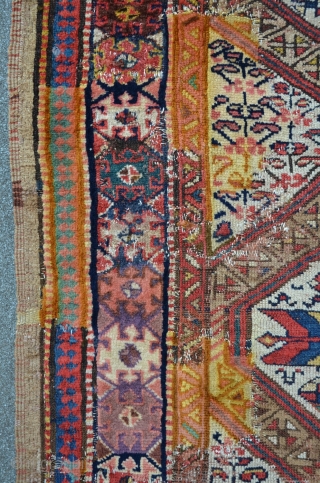 NWP Kurdish rug with camelhair border, 347 x 121 cm, some old re-knotting with faded away colors, beautiful drawings.              