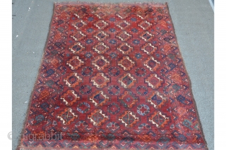 Amu Darya Ersari main carpet, 227 x 182 cm, some old repairs and damages on the upper end. Deep saturated dark red ground color. "Sary" main gul. Secundary gul is shown in  ...