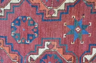 Amu Darya Ersari main carpet, 227 x 182 cm, some old repairs and damages on the upper end. Deep saturated dark red ground color. "Sary" main gul. Secundary gul is shown in  ...