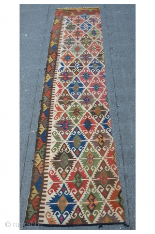 Antique Anatolian kilim fragment with "Elibelinde" pattern, deep saturated colors, 305 x 76 cm                   