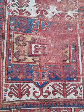 Fachralo Prayer rug. 100 x 157 cm, second half 19th. A damaged beauty in as found condition.                