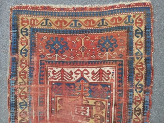 Fachralo Prayer rug. 100 x 157 cm, second half 19th. A damaged beauty in as found condition.                