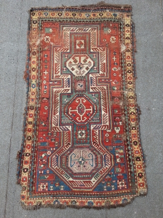 Caucasian Shirwan, 19th c. ca, 113 x 207 cm, with many lovely homemade repairs on sides and ends, nice colors.             