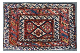Kurdish Bagface with brilliant colors and meaty floor. 87 x 55 cm, several old restorations at the main bordure.              