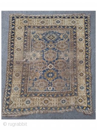 East Caucasian, Baku region, 120 x 139 cm, beautiful composed with pastell colors, very damaged 19th rug.                