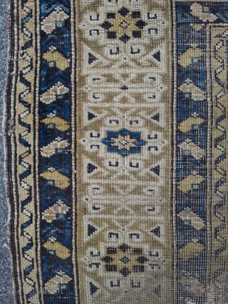 East Caucasian, Baku region, 120 x 139 cm, beautiful composed with pastell colors, very damaged 19th rug.                