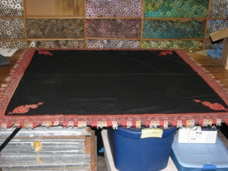 Black ground assembled Kashmiri embroidery. 65"x65"  The boteh in the corners are appliqued to a twill woven wool cloth.  Fine and lustrous, but I hesitate to call it "pashmina". I  ...