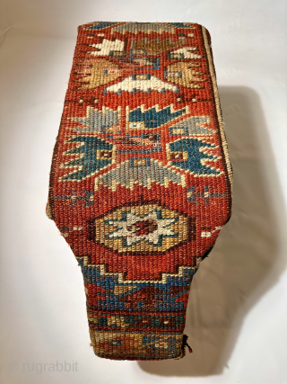 Antique Anatolian Armenian Yastik fragment mounted on a twisted iron shoe fitting stool. Unique and interesting historical artifact.               