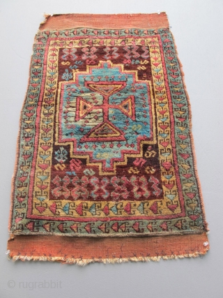 Early Anatolian Yastik. Armenian, Assyrian or Greek. As found with kilim flaps stitched over on the backside. I took the liberty to clip the black threads and turn the flat woven panels  ...