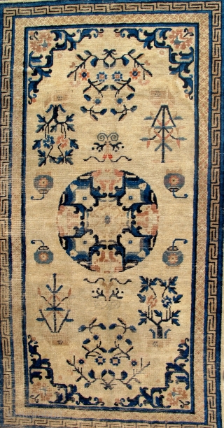 Early 1800s Chinese or Tibetan rug. 82 x 53 inches. This rug is gorgeous and has some wear. No repairs.             