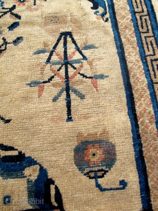 Early 1800s Chinese or Tibetan rug. 82 x 53 inches. This rug is gorgeous and has some wear. No repairs.             