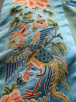 A finely embroidered XIXth C. Chinese green silk robe.                        