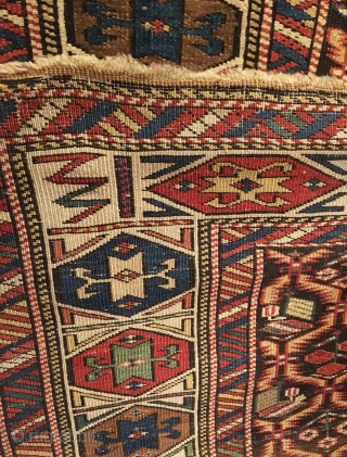 Daghestan Runner.  Circa 1850.  Stunning Caucasian runner exhibiting curvature to field design and unequal minor borders: a hallmark of tribal weaving. Daghestan border.   Some field motifs appearing three  ...