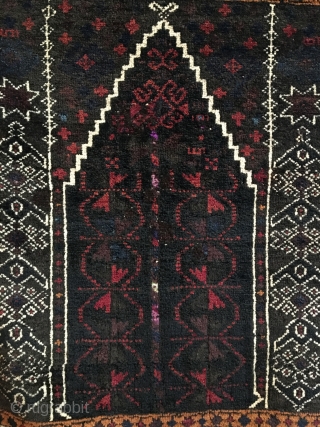 Kaudani Baluch Prayer Rug.  SE Persia.   Circa Antique.  Silk highlights in center. 

Full pile.  Few old invisible reweaves. (only visible on back).  54x38.  7 colors.  ...