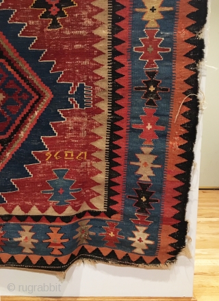 Antique Caucasian Kilim.  Dated 1904.  Second date of remembrance, 1936.  Truly tribal.  Original four sides.  10 colors.  9’ 6" x 4’ 3".  Delicately hand washed. 