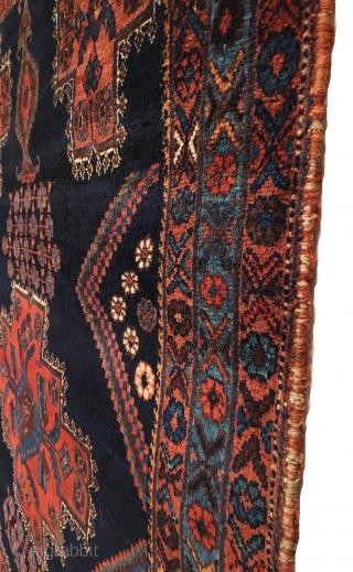 Antique Afshar Rug. Late 19th Century. Stylized multi-colored vases rest on top and bottom with central striking medallion. Truly a tribal piece. All original in very good condition. Remnants of kilim ends  ...