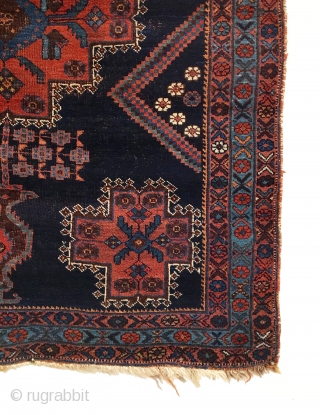 Antique Afshar Rug. Late 19th Century. Stylized multi-colored vases rest on top and bottom with central striking medallion. Truly a tribal piece. All original in very good condition. Remnants of kilim ends  ...