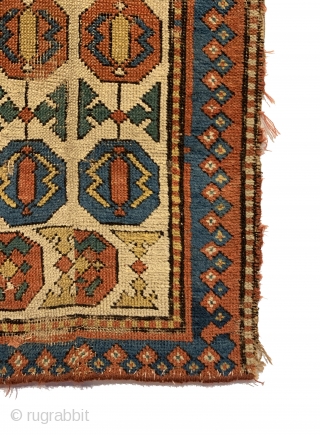Antique Rare Gendje Small Rug. Circa Early. Two rows of elongated Gendje border ornaments on white ground field framed by blue trefoil border. Saturated dyes including a nice green. Original condition. Old  ...