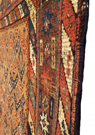 Antique Kurdish rug.  Floral field design.  Inscription top right corner: 1274 = 1857?. Very good condition considering age.  One localized line of visible wear.  7 colors including purple.  ...