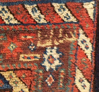 Antique Kurdish rug.  Floral field design.  Inscription top right corner: 1274 = 1857?. Very good condition considering age.  One localized line of visible wear.  7 colors including purple.  ...