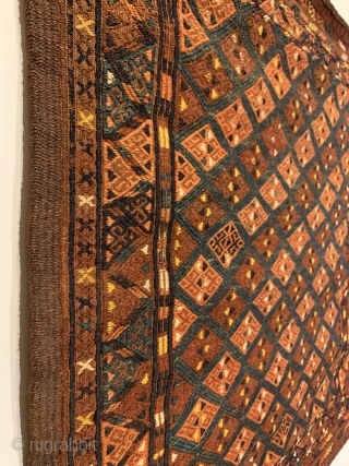 Antique Turkmen Yomud (Yomut) Torba. Central Asia. Last Quarter 19th Century. Repeating design with alternating colored rows of hooked diamonds. Embroidered silk and wool on wool foundation. 7 colors. 2’6” x 3’0”.  ...