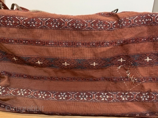 Antique Yomud Chuval. 19th Century. It is rare to find complete storage bags as many have been dismembered due to harsh conditions of seasonal migration. Sides feature a stepped hooked gul. Rear  ...