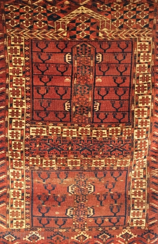 Antique Tekke Ensi.  Mid 19th Century.  Tree border and alternating ‘candelabra’ kush design.  This piece is a predecessor to the more precise weavings of the latter period.  6  ...