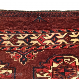 Antique Yomud Chuval.  3rd Quarter 19th Century.  9 Gul field arrangement.  Erre secondary gul with tuning fork border.  Very good condition considering age, reselvaged.  7 colors.   ...