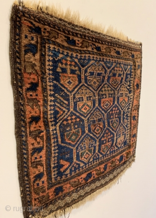 Antique Timuri Baluch Bagface. 3rd Quarter 19th Century. Dokhtar-I Ghazi honey comb design. Saturated colors including a nice green. Very good condition. Original four sides and no repairs. 6 colors. 1'8" x  ...