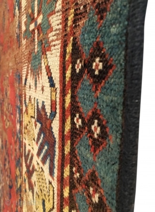 Early Caucasian Kazak Long Rug. 1st Half 19th Century. Great use of saturated coloration. Note the 'crab border,' appears to be four birds arrayed around cross palmettes via striped vines. Wear to  ...