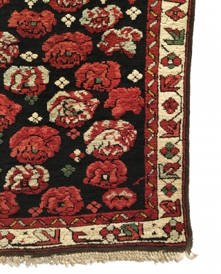 Antique Caucasian Seychour Cabbage Dowry Rug. 3rd Quarter 19th Century. Cabbage heads float on dark brown field. Attractive floral meander border accentuates the field design. All four sides original with macramé end  ...