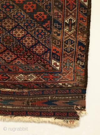 Antique Timuri Baluch Rug.  Last Quarter 19th Century.  Diagonal rows of stepped cross motifs form diamond pattern on field.  Outlined by three color rich geometrically styled borders.  Good  ...