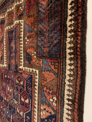 A rare and spectacularly colored Timuri Prayer Rug dating to the Mid 19th Century. Please note the use of color, specifically steel blue, peach, and purple. The honeycomb field is enclosed by  ...