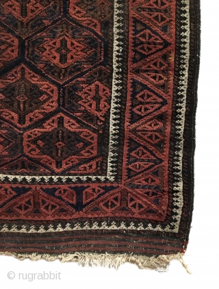 Antique Baluch Rug. Timuri, Sangtshuli. 3rd Quarter 19th Century. This is an early collectors rug. The main border consists of alternating triangles of tulip like three stemmed plants. Bright white medakhyl (medical)  ...