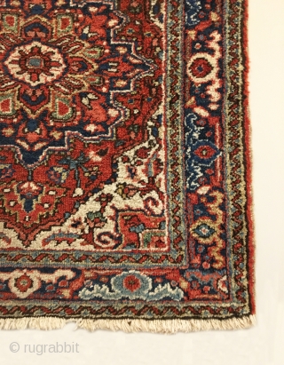 Antique Small Heriz Rug.  Early 20th Century.  Very colorful with strong central medallion.  Mint condition with full pile.  Original four sides.  10 colors.  2’9” x 2’7”.  ...