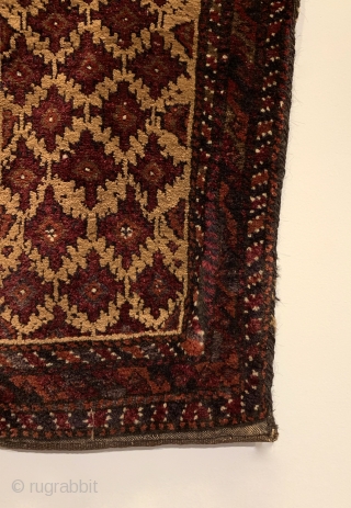 Antique Baluchi Tribal Cushion (Balisht). Northeast Persia. Stepped purple pendants on camel field. Full pile in original condition. 5 colors. 2’7” x 1’4”. Delicately hand washed.

See Christie’s East, Sept. 1990: J.P.J Homer  ...