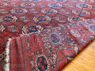 8’6” x 6’8” Antique Tekke Main Chuval Gol Rug [116].

An antique Tekke main rug. A pattern that displays 4 X 10 gols with the rare chuval gol. Including a maroon field, and  ...