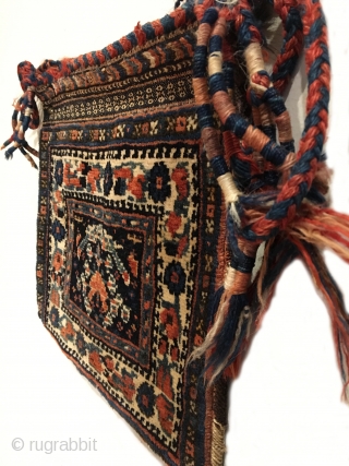 Antique Afshar Chanteh. Early 20th Century. Rare and fully intact small bag. A tribal treasure. Chevron kilim back. Mint condition considering age. Original sides. 7 colors. 1’0” x 1’1”. Carefully hand washed. 