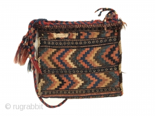 Antique Afshar Chanteh. Early 20th Century. Rare and fully intact small bag. A tribal treasure. Chevron kilim back. Mint condition considering age. Original sides. 7 colors. 1’0” x 1’1”. Carefully hand washed. 