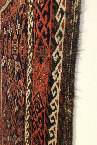 Antique Baluch Rug.  Northeast Iran.  2nd Half 19th Century.  Serrated leaves enclose stepped medallions on blue ground field.  Loss to selvage.  One area of localized wear.   ...