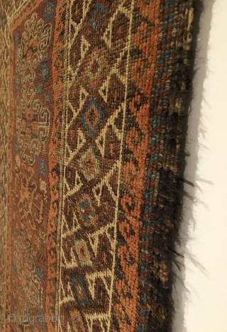 Baluch Rug. Symmetrically knotted group. Hooked medallions float on madder field surrounded by bird pinwheel border.  Last Quarter 19th Century.  Beautiful kilim ends.  6 colors.  51 x 31.5.  ...