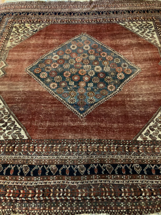 11’4” x 9’10” Antique Quashqi Boteh Main Rug [130] 
Antique Quashqi main carpet. With 16 borders, this piece features an abrashed cranberry field and ivory boteh filled corner brackets. In great condition,  ...