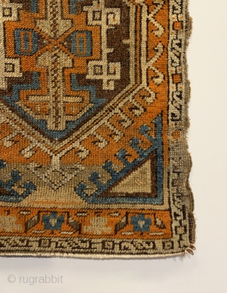 Early Yastik Fragment. Central Anatolia. 2nd Half 19th Century. Abrashed field with saturated colors including strong purple and turquoise. Compare the rendering of center medallion arrows and joined ivory hooks to plates  ...