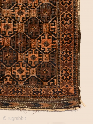 Antique Small Baluch Rug. Circa Early.
Tribal guls enclosing hooked devices and ’S’ dragon motifs arranged in a tiled latticework pattern decorate this early Baluch rug. Natural orange and purplish madder on a  ...