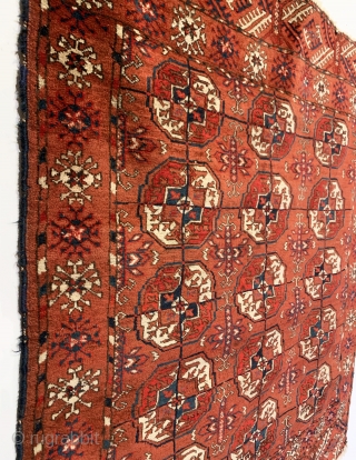 Antique Tekke Small Rug. 4th Quarter 19th Century. Small collectible piece. 15 central gul medallions sit on saturated brick red field framed by stylized geometric alternative indigo and ivory border design. Original  ...