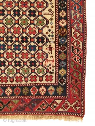 Antique Shirvan Prayer Rug. White Ground. Dated 1295 = Circa 1879. Hexagonal lattice enclosing colorful small flower petals. Note: Field design continued above pentagonal mihrab. Very good condition considering age with even  ...