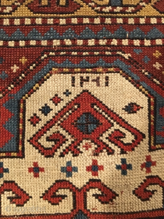 Early Tribal Kazak Prayer Rug. Inscribed Date 1261 = Circa 1845. Very good condition considering age with even wear. No repairs. 7 saturated colors. 2’2 x 3’11. Delicately hand washed.

Note the large  ...